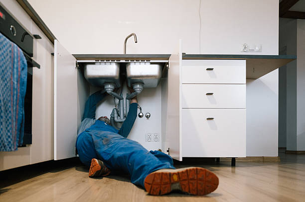 Professional Emergency Plumber technician working in New Lisbon, WI